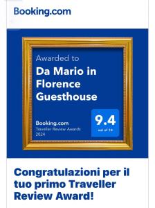 佛罗伦萨Da Mario in Florence Guesthouse的一张金色画架上的照片