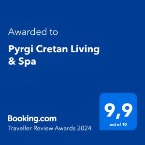 PírgosPyrgi Cretan Living & Spa的手机的屏幕,短信被授予了Pyrex奶油生活和spa