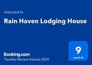 科隆Rain Haven Lodging House的列车避风港住宿的屏风,其文本升级为雨天堂小屋