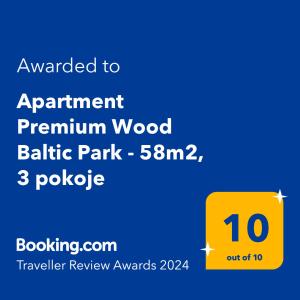 斯蒂格纳Apartment Premium Wood Baltic Park - 58m2, 3 pokoje的黄牌,上面写着被授权指定为木材波罗的海公园