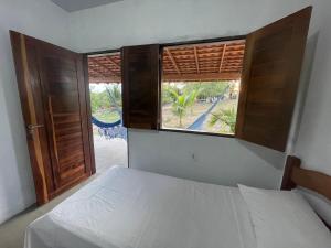 Sítio Paraíso do Caju客房内的一张或多张床位