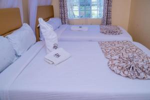 Calfie Resort Kisumu客房内的一张或多张床位