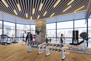 珠海珠海横琴雅辰悦居酒店的大楼内带健身器材的健身房
