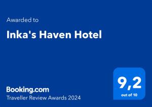 奥兰太坦波Inka's Haven Hotel的蓝屏,文字翻译成iajas港酒店