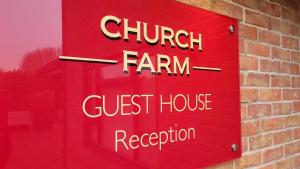 Horsford教堂农场旅馆的教堂农场招待会标志