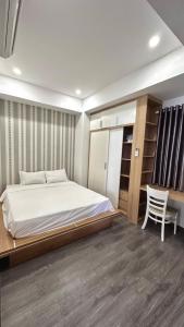 An's Oceanus House Nha Trang客房内的一张或多张床位
