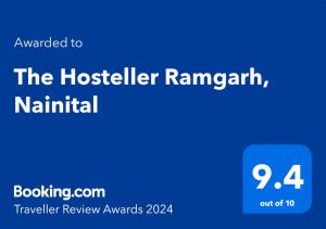 拉姆格尔The Hosteller Ramgarh, Nainital的蓝色的长方形与旅馆老板的字眼相勾结