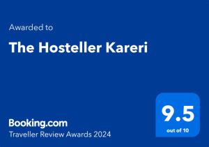 达兰萨拉The Hosteller Kareri的读取旅馆老板卡雷特的蓝色标志