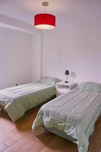 Sueño Andino客房内的一张或多张床位