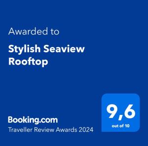 塞萨洛尼基Stylish Seaview Rooftop的带有文本升级为Sykrit首饰的电话的截图
