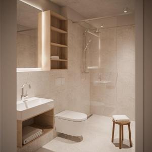卡罗利嫩西尔NOORD Carolinensiel的浴室配有卫生间、盥洗盆和淋浴。