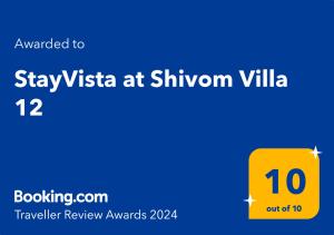 罗纳瓦拉StayVista's Shivom Villa 12 - A Serene Escape with Views of the Valley and Lake的手机的屏幕被带上文字觉醒,以保持维基塔的状态