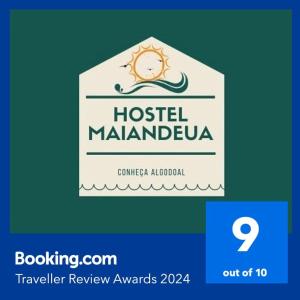 阿尔戈杜瓦尔HOSTEL MAIANDEUA的带有标志的麦曼德夫拉酒店标志