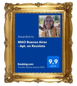 布宜诺斯艾利斯MAO Buenos Aires - Apt. en Recoleta的一张金色画面中女人的照片