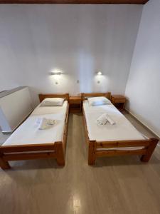Kavos Panorama Complex客房内的一张或多张床位