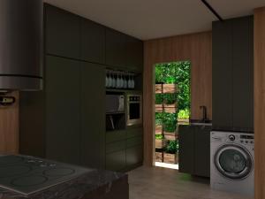 奥林达Duplex的厨房配有洗衣机和洗衣机。