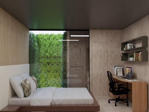 奥林达Duplex的一间卧室配有一张床、一张书桌和一个窗户。