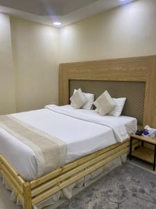 Al Hussam Hotel Apartments客房内的一张或多张床位