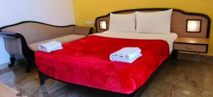 卡兰古特酒店客房内的一张或多张床位