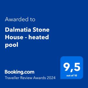 BiorineDalmatia Stone House - heated pool的电话的屏风,有石头房子的温水游泳池