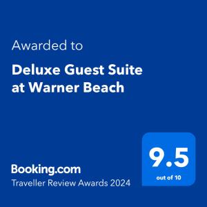 KingsboroughDeluxe Guest Suite at Warner Beach的蓝色标语,意在将套房送至温暖的海滩