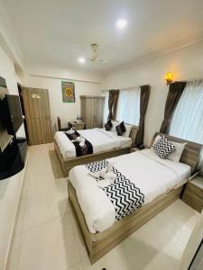 Hotel Janakpur Inn客房内的一张或多张床位