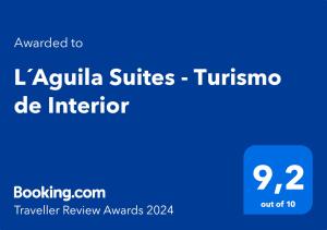 马略卡岛帕尔马L´Aguila Suites - Turismo de Interior的蓝色长方形与“拉奎拉套房”的图里斯莫拜特词