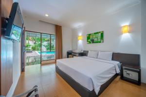 斯巴泽欧巴厘岛酒店客房内的一张或多张床位