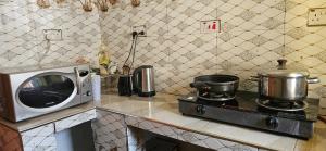 Kamili Homes - Apt 2, Morogoro的厨房或小厨房