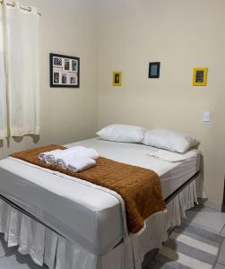 Casa Aconchego客房内的一张或多张床位