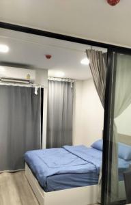 1 Bed Room Near Saphanmai BTS, Don Mueang Airport客房内的一张或多张床位