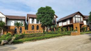 巴位Thang Mây Village Resort的一座房子,上面标着我的院子