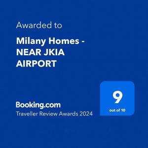 内罗毕Milany Homes - NEAR JKIA AIRPORT的一部电话的屏幕,上面有文字要到基拉机场附近的军用住宅