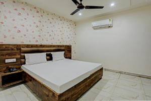 Hotel Ganga Palace客房内的一张或多张床位