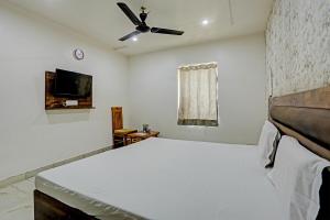 Hotel Ganga Palace客房内的一张或多张床位