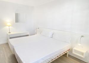 Apartamentos Morito Beach客房内的一张或多张床位
