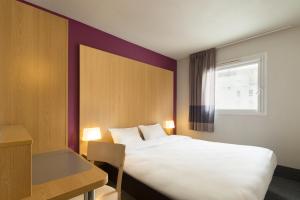 B&B HOTEL Perpignan Sud Marché International客房内的一张或多张床位