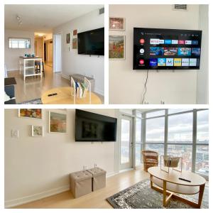 多伦多Duplex INN的客厅设有壁挂式平面电视。