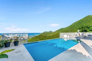 Saint MartinMagnifique villa 3 chambres sur les hauteurs de Grand Case的海景别墅 - 带游泳池
