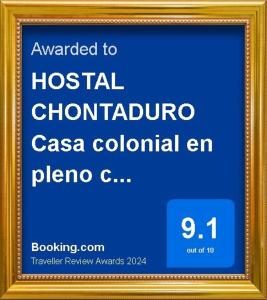 卡利HOSTAL CHONTADURO Casa colonial en pleno centro histórico de Cali- Se alquila la casa entera para 12 o 13 personas o por habitaciones的金框中标牌的照片