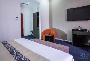Gloria Inn Hotel - Ndola客房内的一张或多张床位