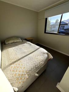 Acogedor hogar en Rinconada de los Andes客房内的一张或多张床位