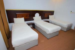 فندق ربا الحجاز客房内的一张或多张床位