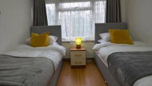 3 Bed house in Croydon - Great for Longer Stays Welcome客房内的一张或多张床位