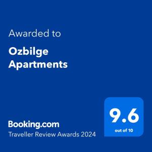 凯里尼亚Ozbilge Apartments的给可能的公寓的手机的屏幕截图