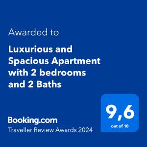 米西索加Luxurious and Spacious Apartment with 2 bedrooms and 2 Baths的一部手机的屏幕,上面的文本被授予豪华的自发任命,