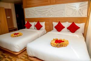 Hotel Kedarnath客房内的一张或多张床位