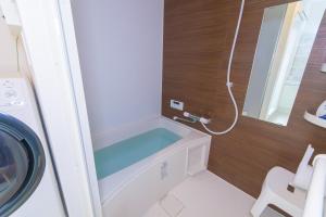 福冈fuu的一间带洗衣机和水槽的浴室