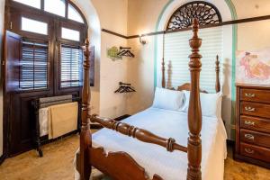Charming Retreat in Old San Juan客房内的一张或多张床位