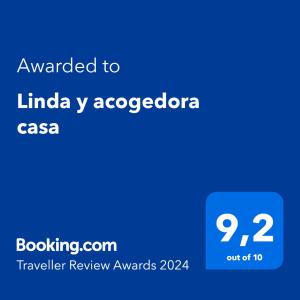 佩雷拉Linda y acogedora casa的手机的屏幕,上面写有给非洲人后裔的文字